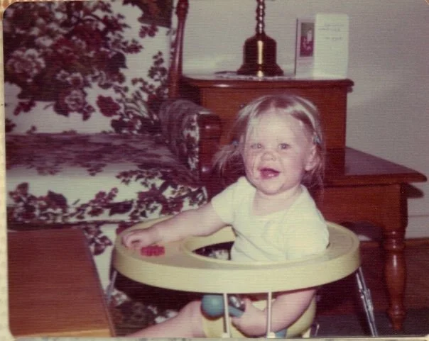 The person behind the art around here. 

The kindergarten photo gets me every time. My school photos over the years always featured some kind of wtf face.