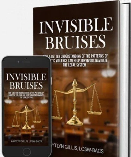 A book titled 'Invisible Bruises' and a smartphone displaying the same cover. The book appears to be about understanding patterns of domestic violence and legal help, featuring a gold balance scale on the cover.