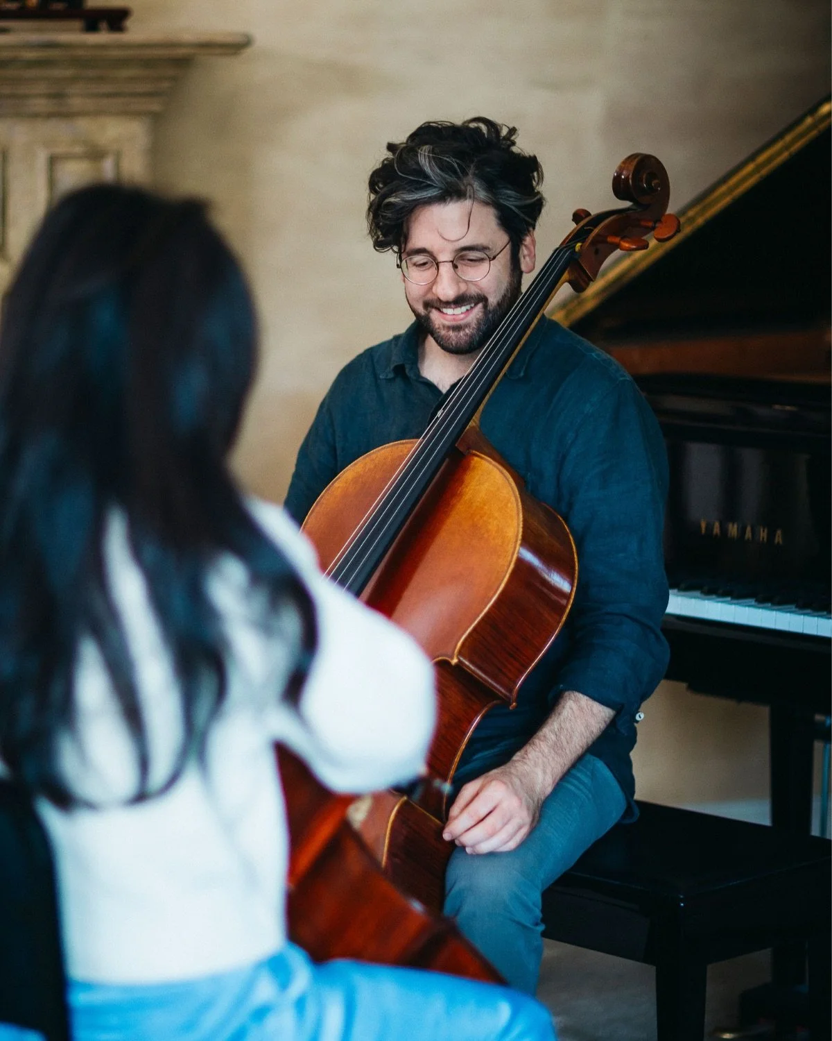 adult cello student and cello teacher