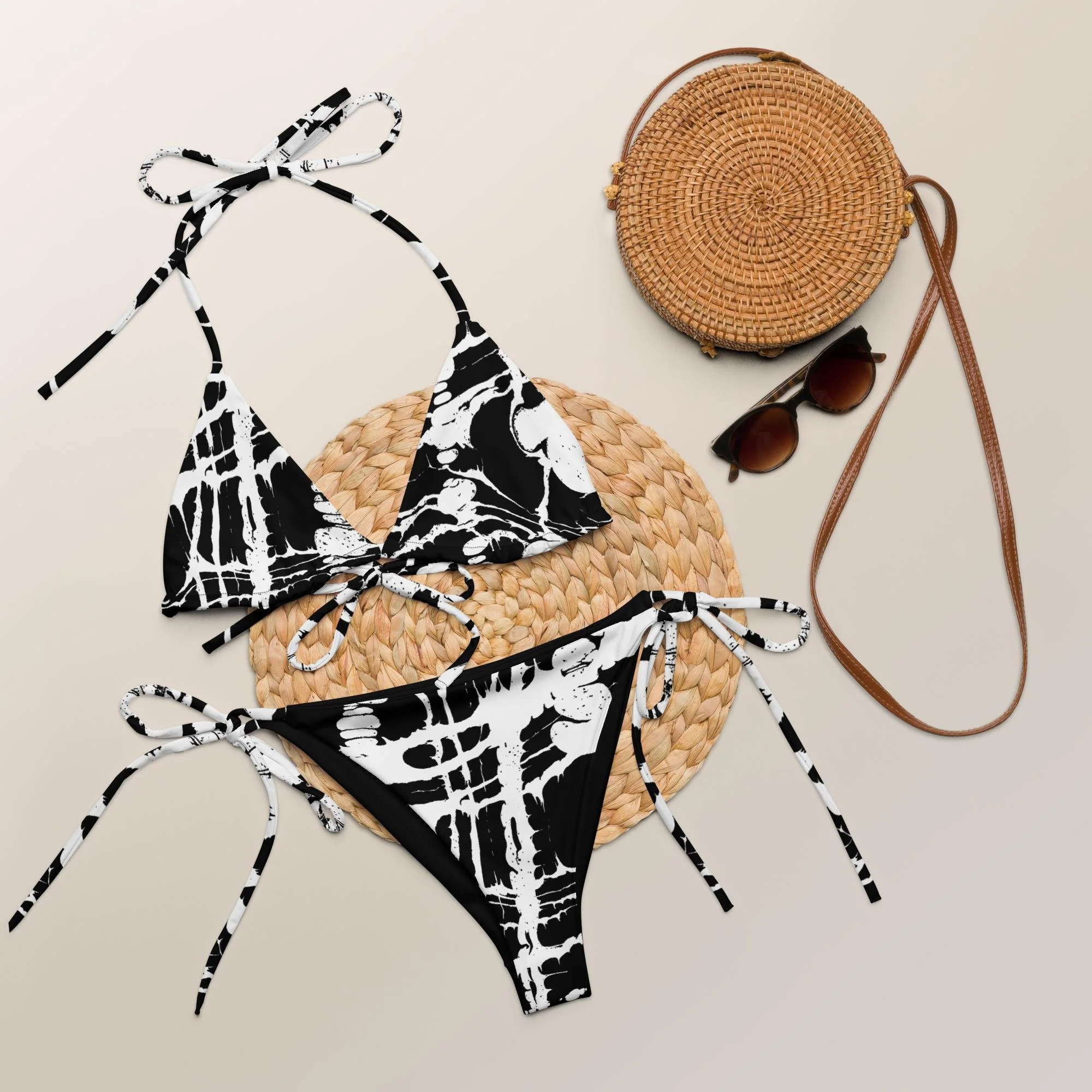 all-over-print-recycled-string-bikini-white-front-6a3958b6580a6.jpg