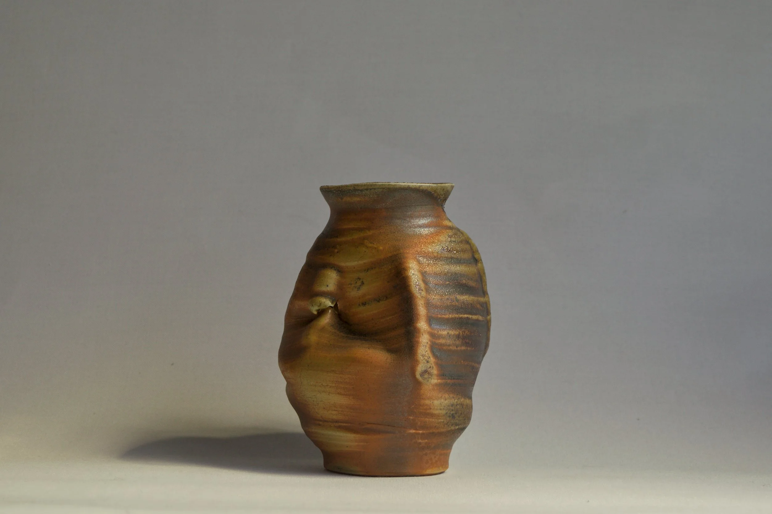 The work reflects on the moment when tradition, repeated without reflection, begins to fold back onto itself. Forms that once carried living knowledge can gradually become echoes of earlier gestures, reproducing shape without the conditions that orig