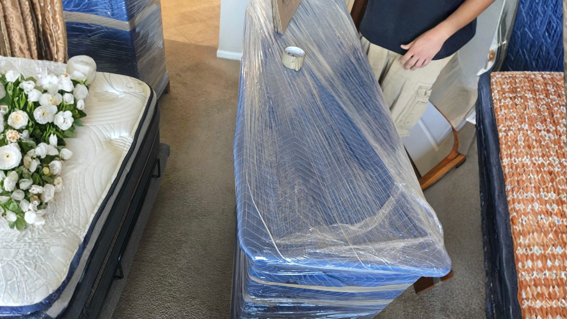 Headband Movers crew laying floor protection during an apartment move in Wheat Ridge, CO.