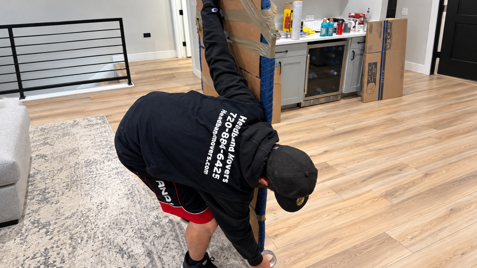 headband-movers-crew-wrapping-furniture-in-the-highlands