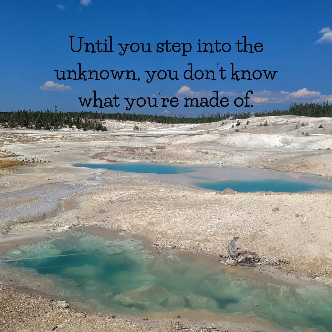 Landscape with turquoise geothermal pools in sandy terrain and a blue sky, featuring the text 'Until you step into the unknown, you don't know what you're made of.'