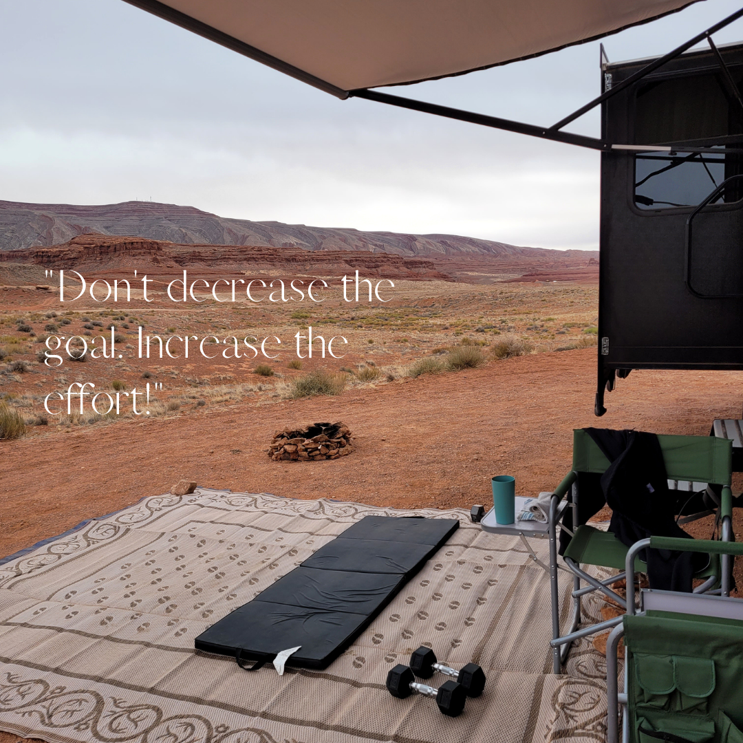 Camping setup with exercise equipment in desert landscape, motivational quote on image.