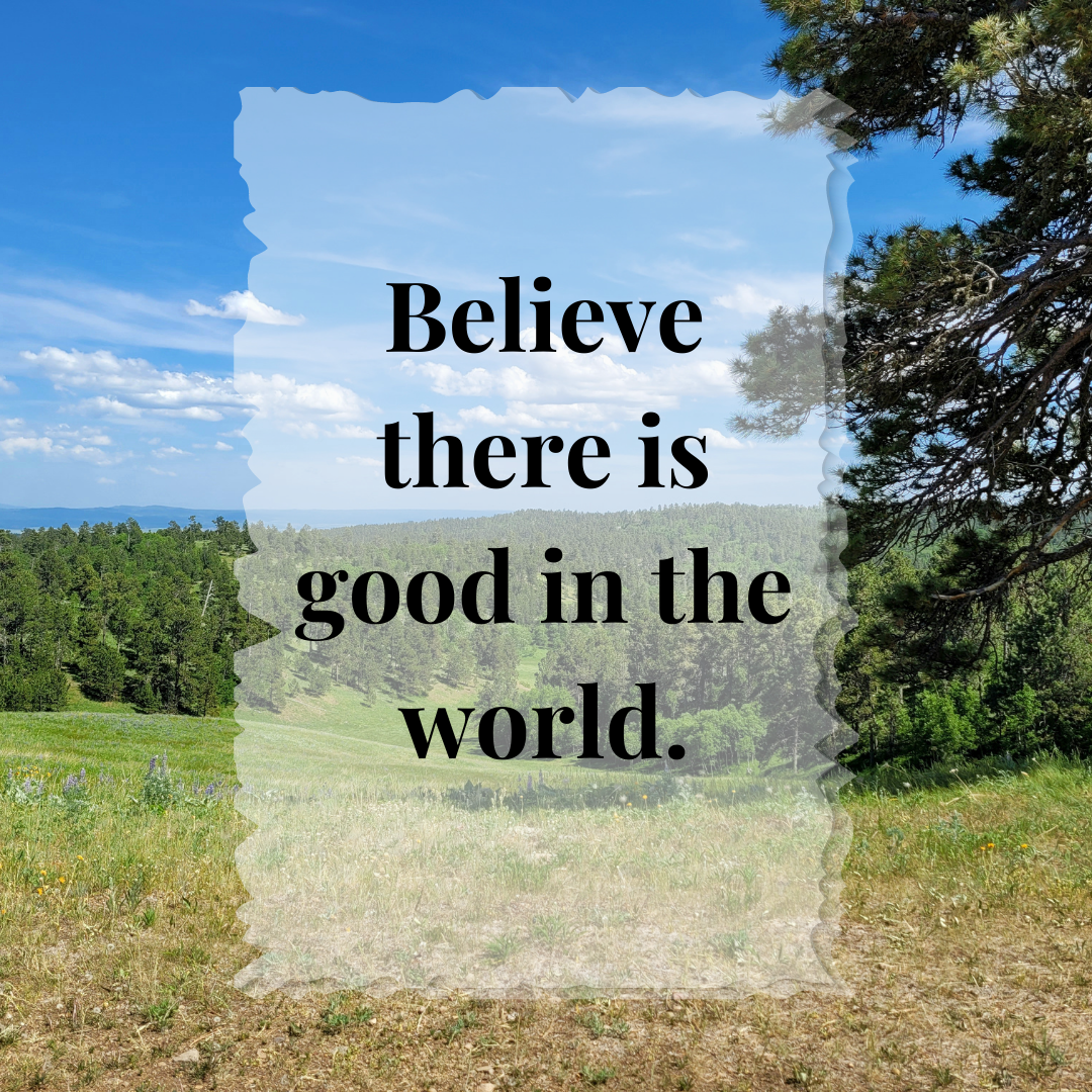 Inspirational quote on scenic landscape background with trees and blue sky.