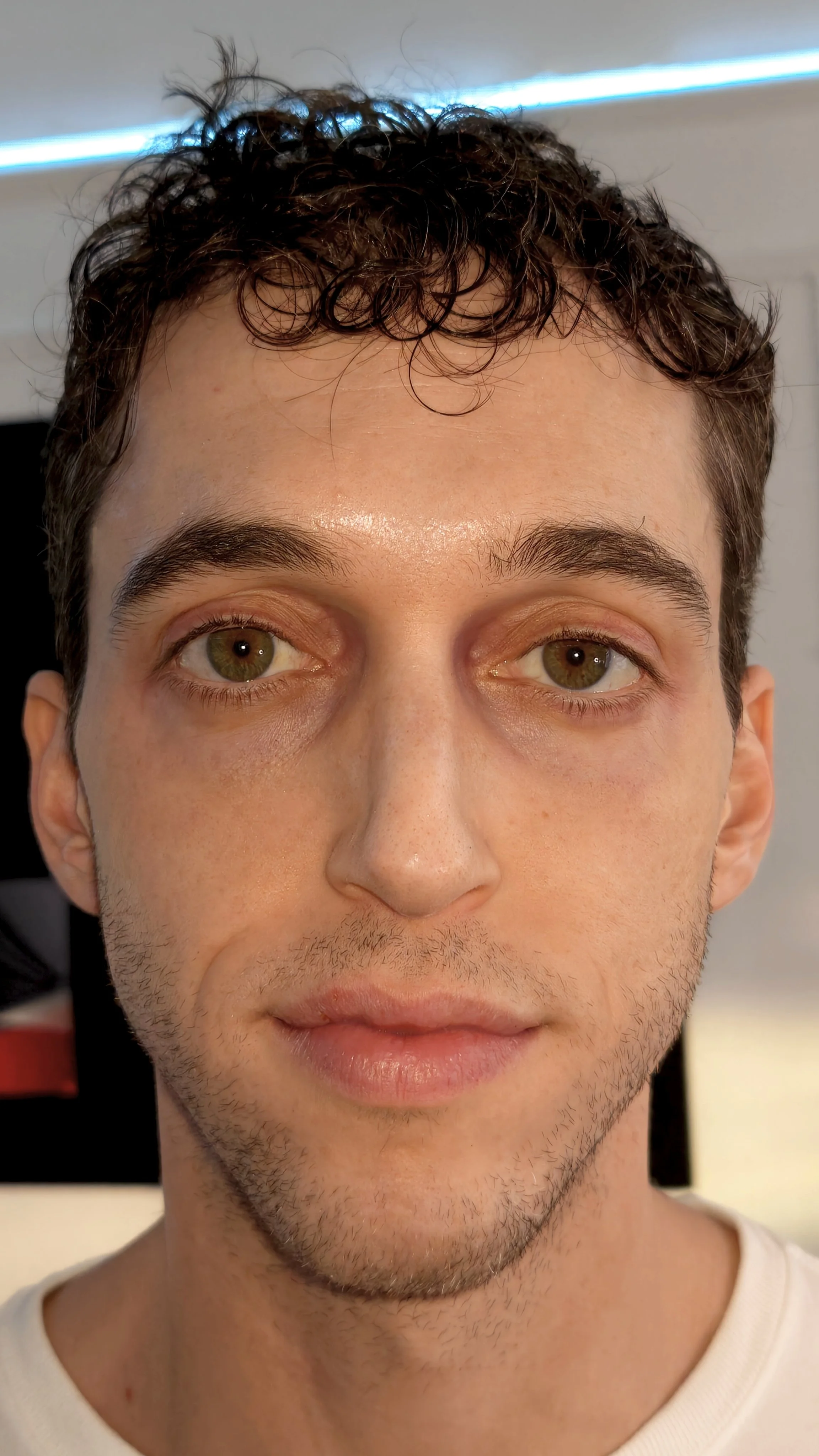 Slightly tired/haggard and greasy-haired look