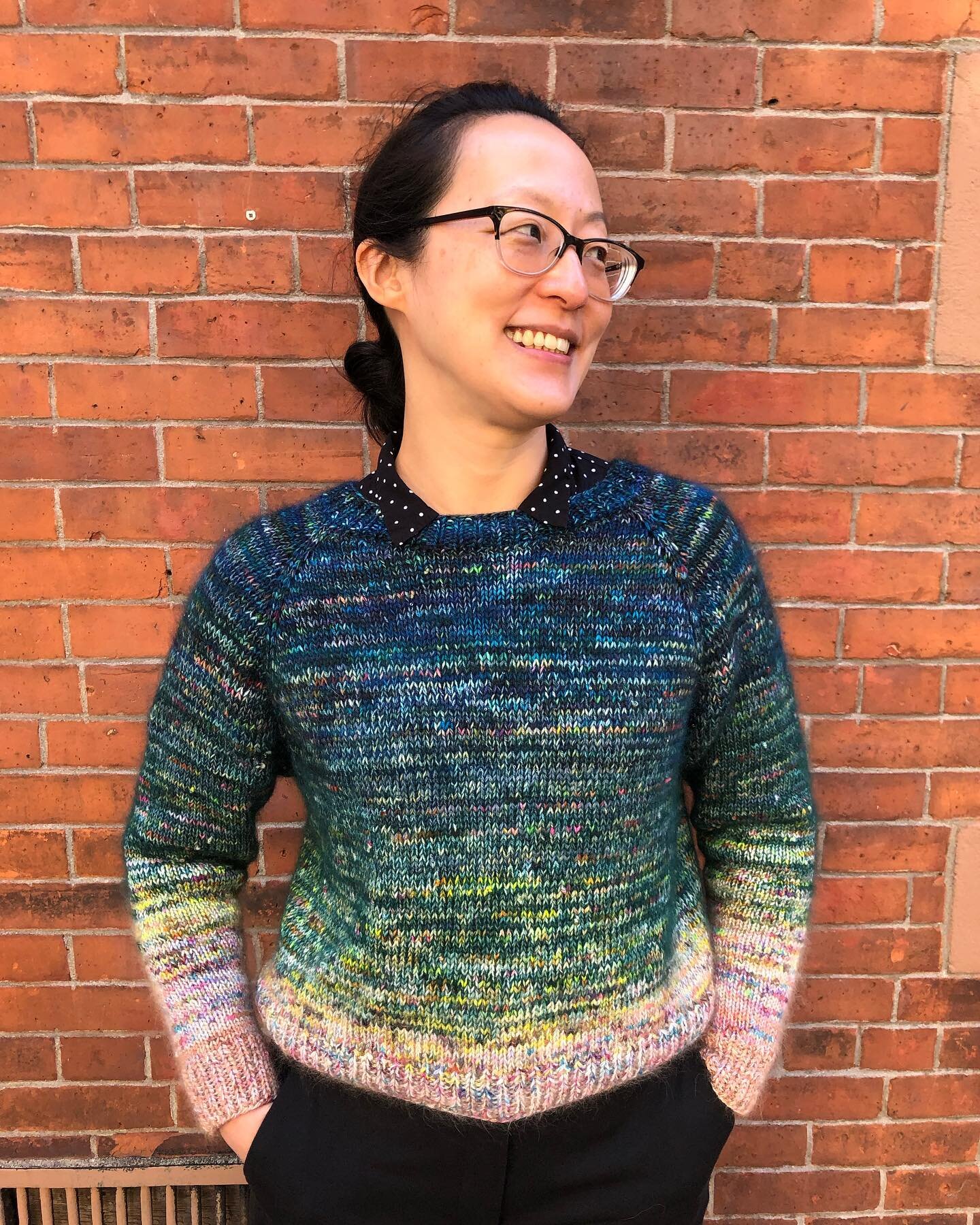 This is a sweater that I knit in the summer! I had: a pile of yarn leftovers, the new Beyonc&eacute; album on repeat, and Covid. 
I sort of organized my scrap yarn into a green ombr&eacute; when I started, and improvised from there. It is an extra fu