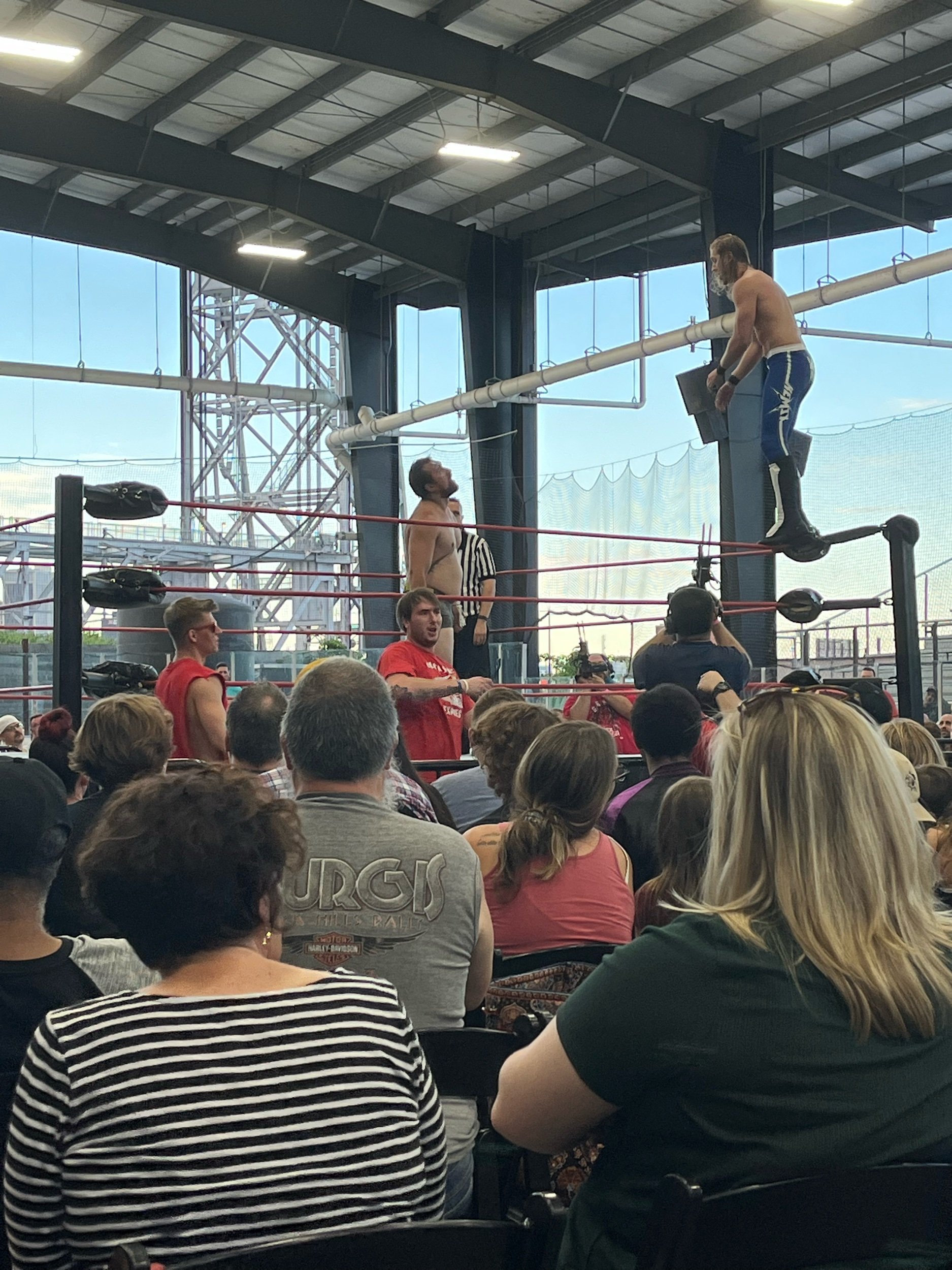 Kevin Bennett perched on the top rope