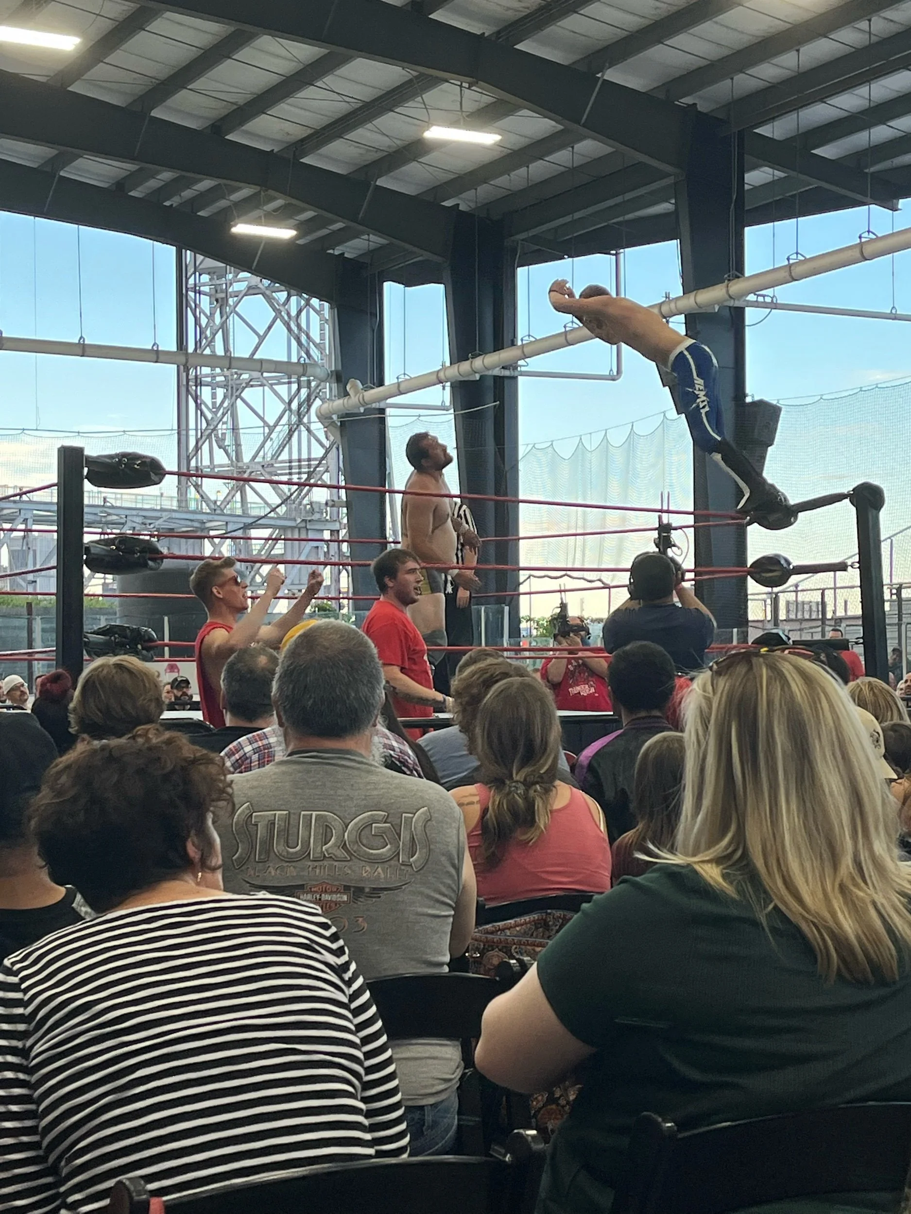 Kevin Bennett takes flight onto a dazed James Sayga