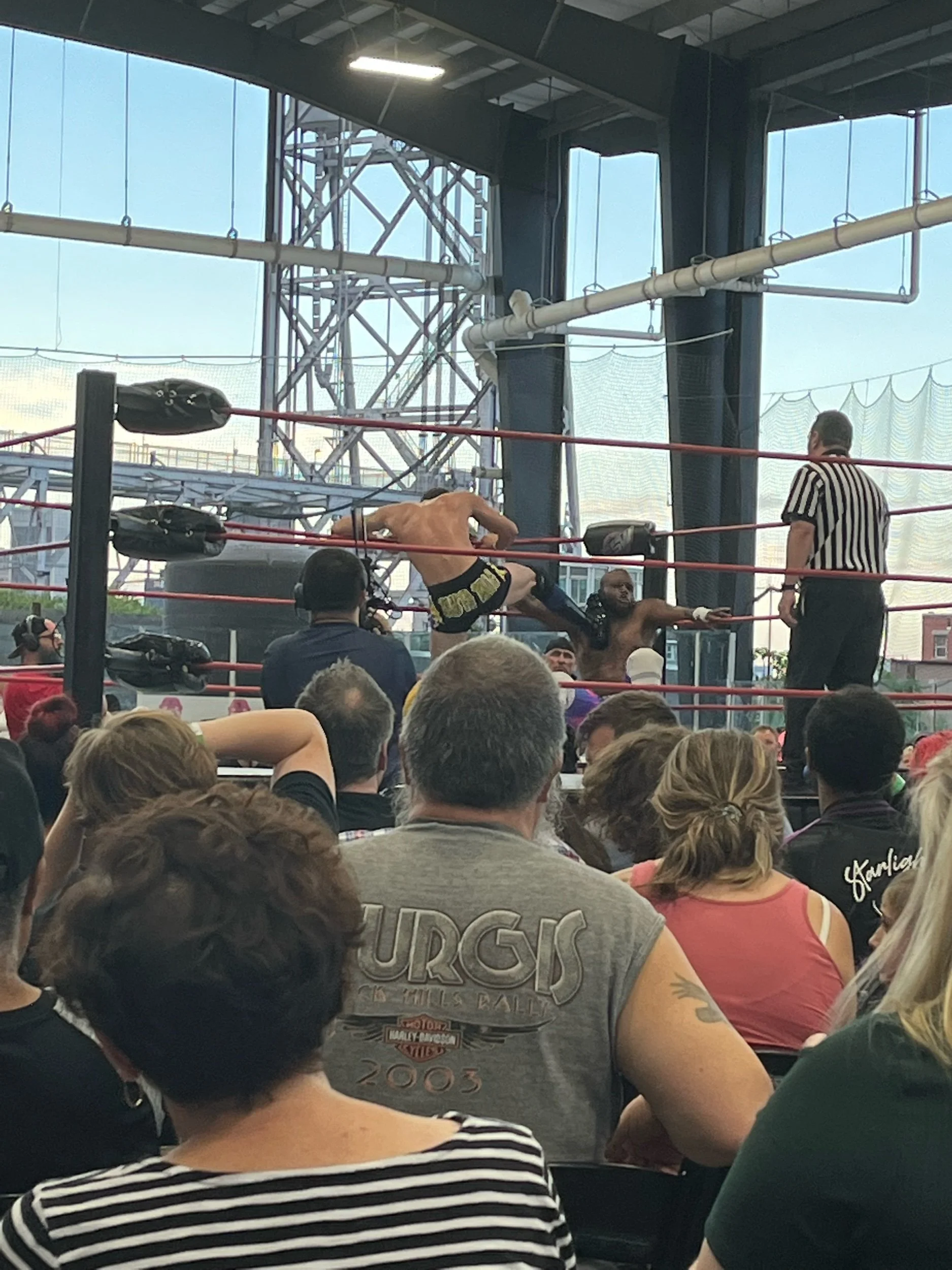 Alec Price lays the boots in to Frankie Feathers