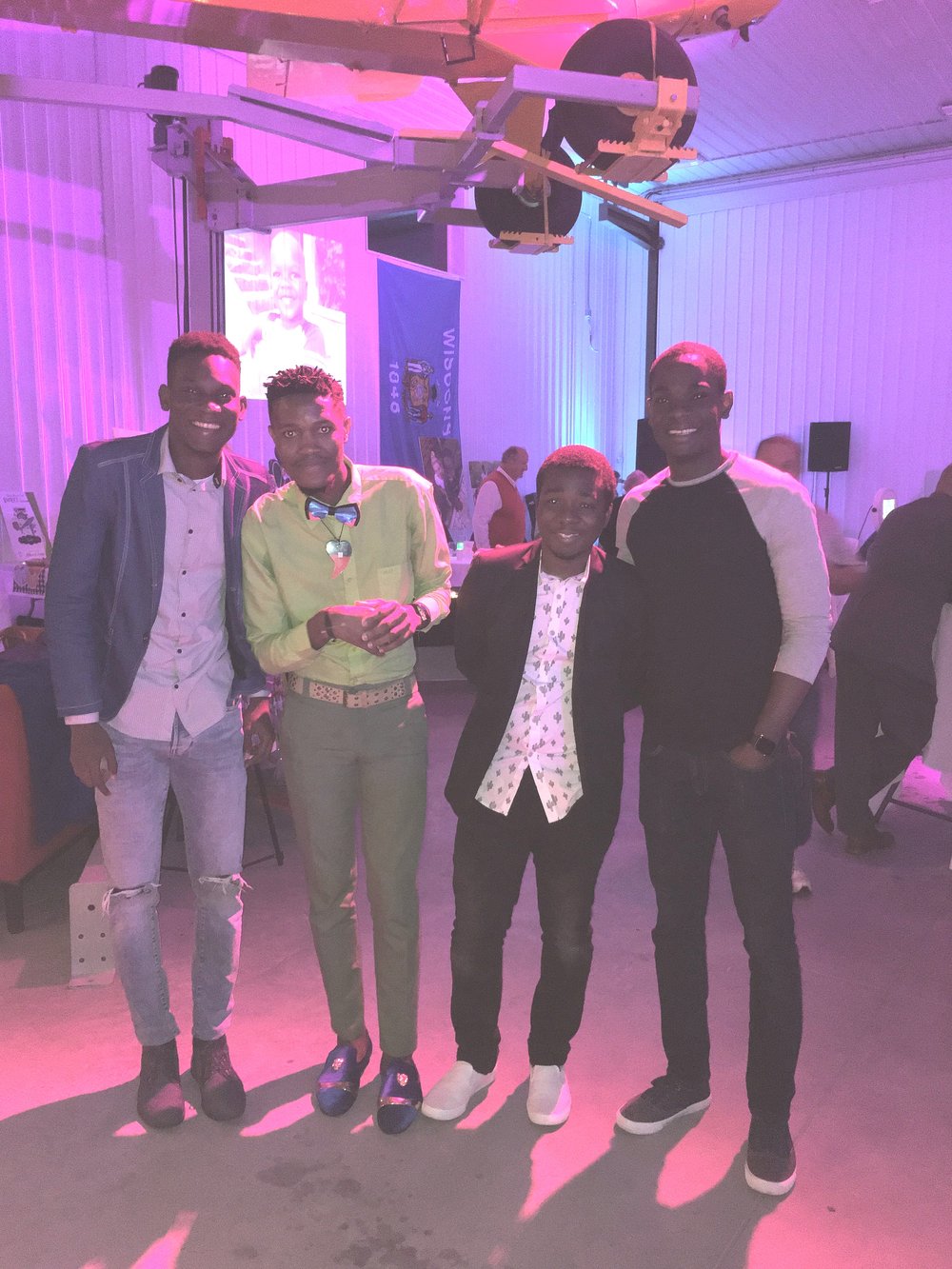  From L to R: Sassy, Wilso, Remy and Swenson. All four are from Haiti and currently in the U.S. for school. This is at a fundraising event in Madison, Wis. for an orphanage in Fond Blanc, Haiti.  