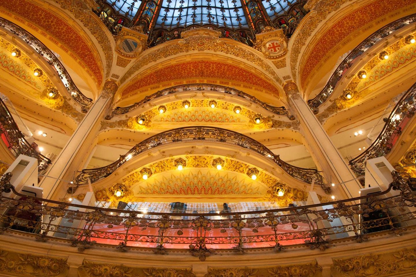 Galer&iacute;es Lafayette Paris Haussmann is a famous grand magasin in the 9th arrondissement. Even  if you don&rsquo;t buy anything, it&rsquo;s worth visiting to see the beautifully ornate ceiling and at Christmastime, the decorations are amazing.
#
