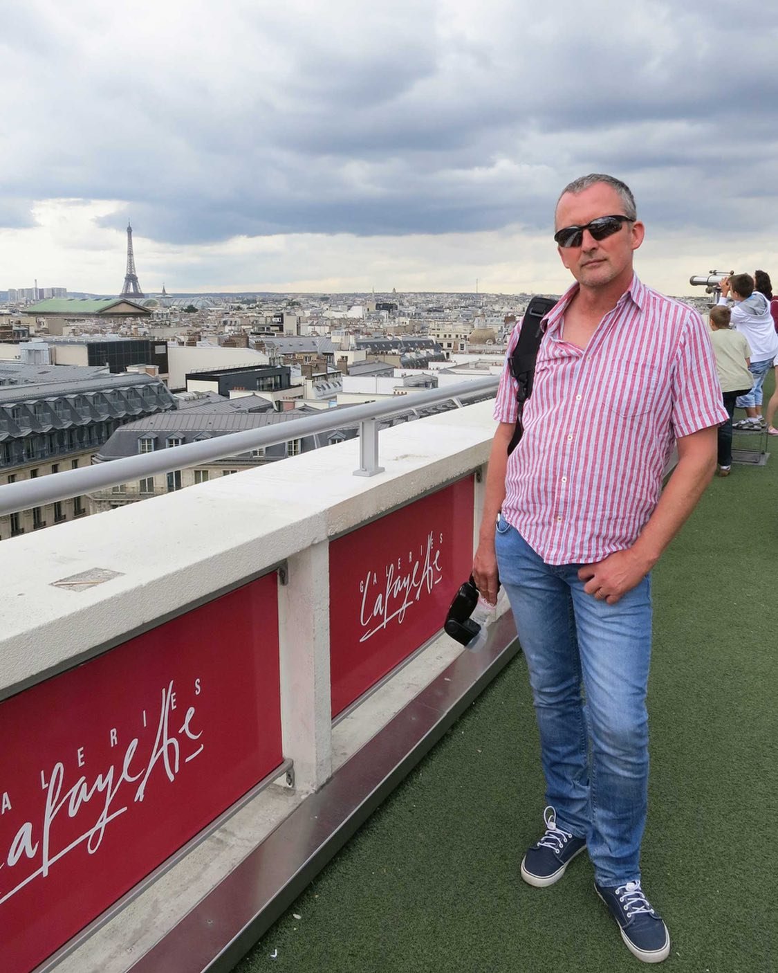 @chrishandel_photographer caught on the other side of the camera. Enjoying a wonderful view of the Parisian rooftops and the Eiffel Tower. Following an afternoon fashion show in @galerieslafayette Haussmann we headed to the rooftop for the view. Rese