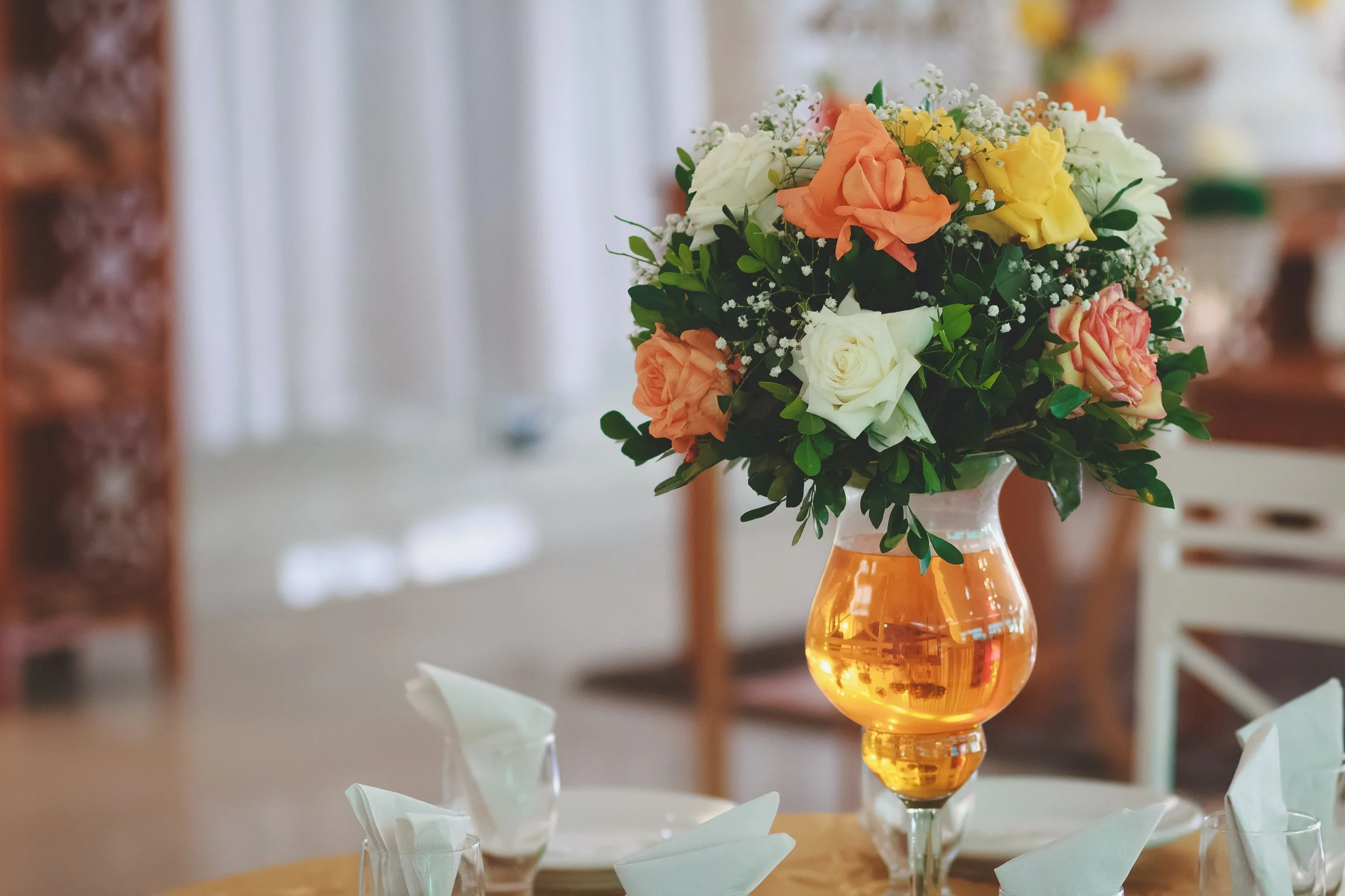 At a wedding with hair curled and waist cinched into a rust-colored dress and you’re there, too
