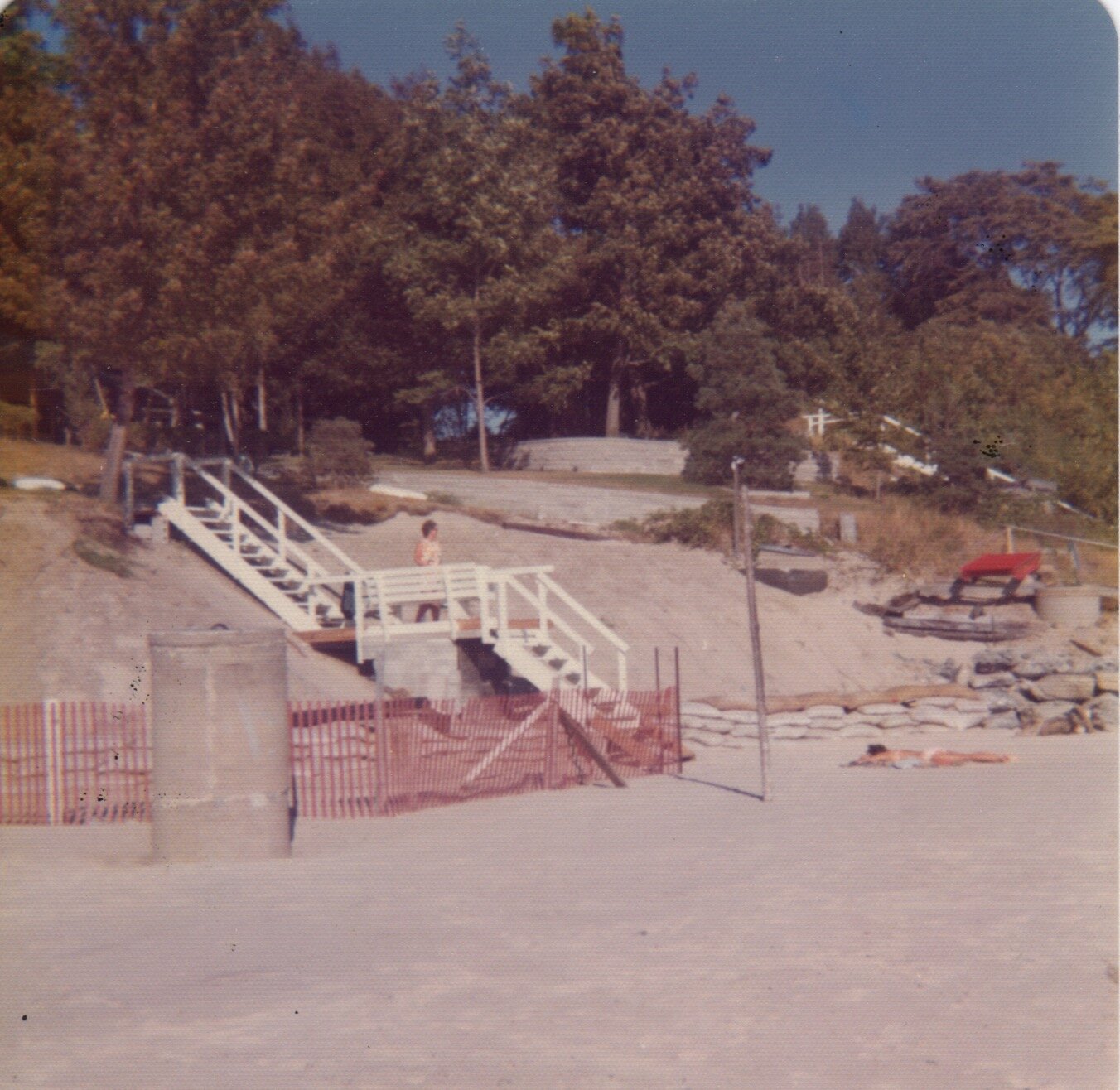 Benches restored to the landing. The well in the foreground is the creek-side neighbors and would last a few more year until it was lost to a storm (1971)
