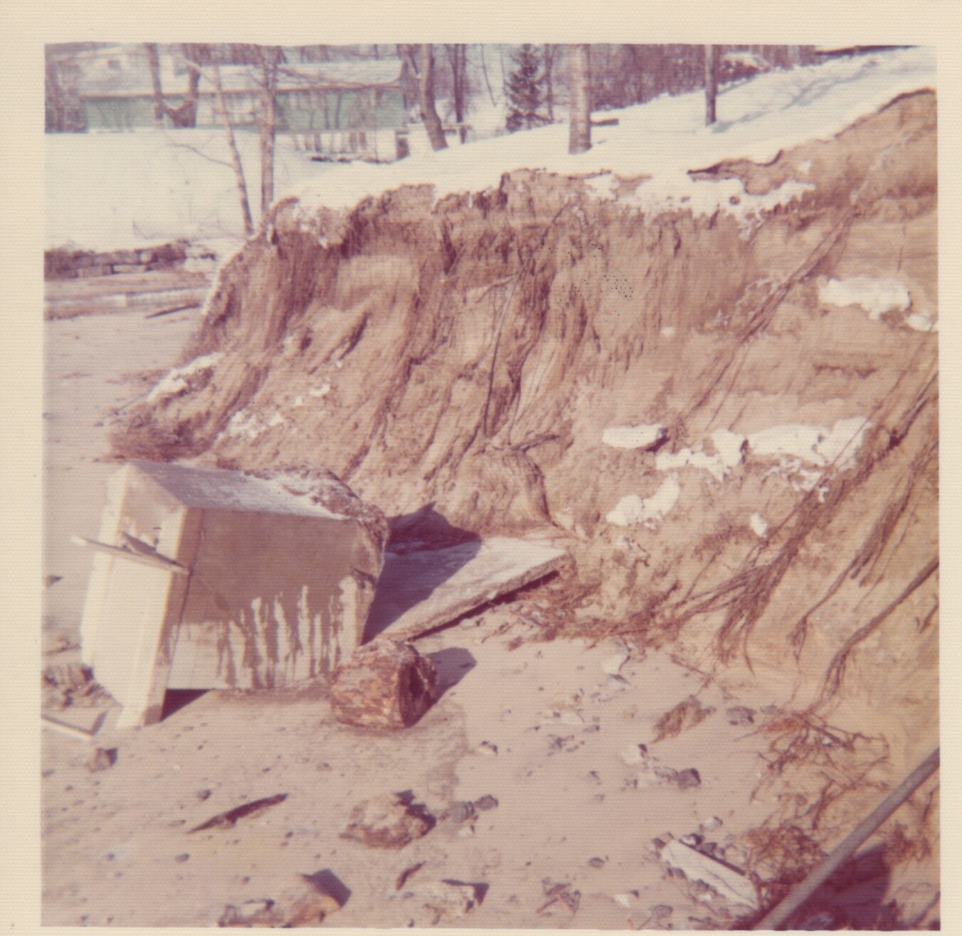 That glorious pump house only lasted one season. A (hopefully) 100 year spring storm took out the railroad tie wall, 15 feet of bank and left the pump house toppled on the beach (1971)