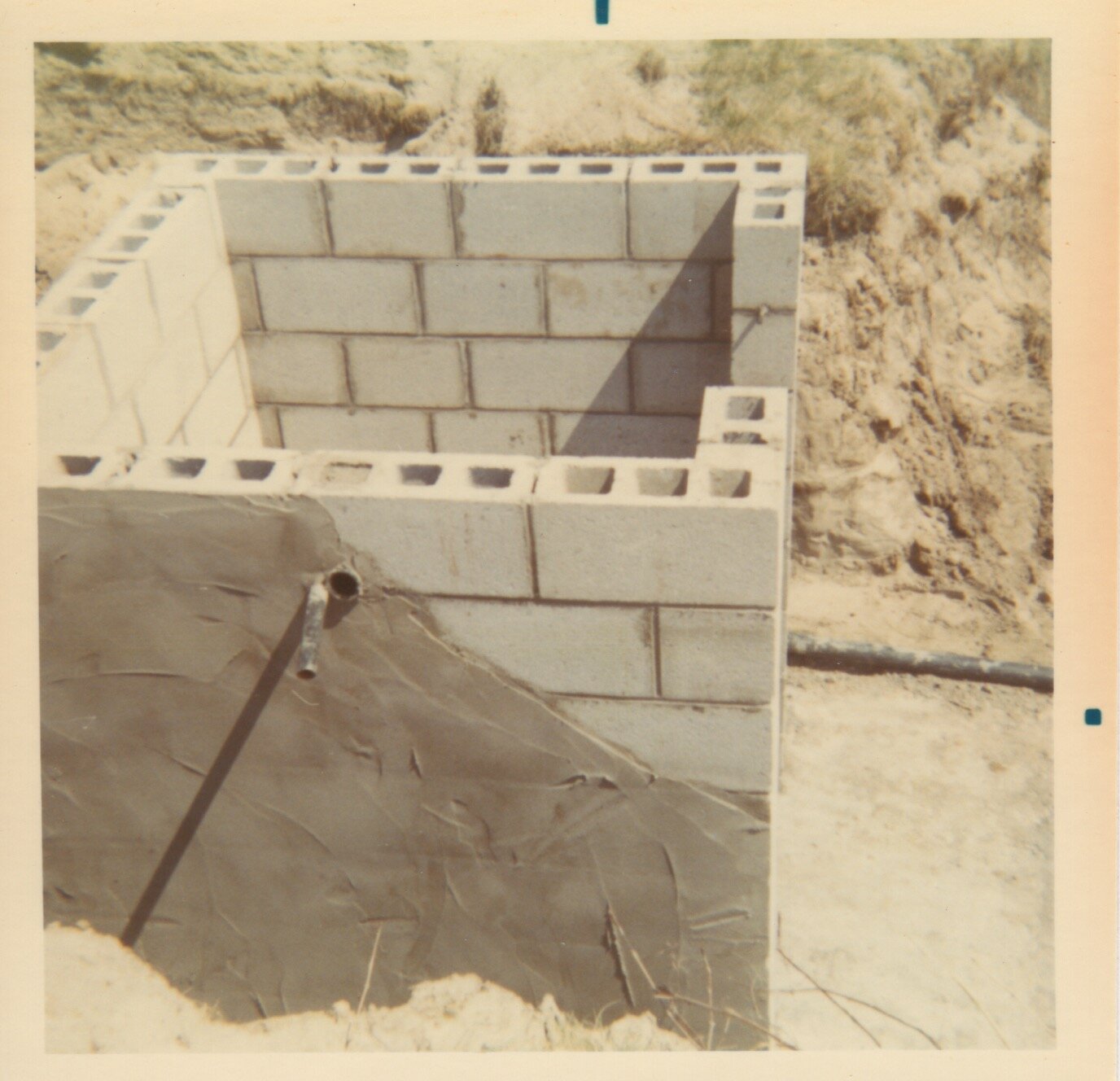 Doorway opens under stairs on lake side (1970)