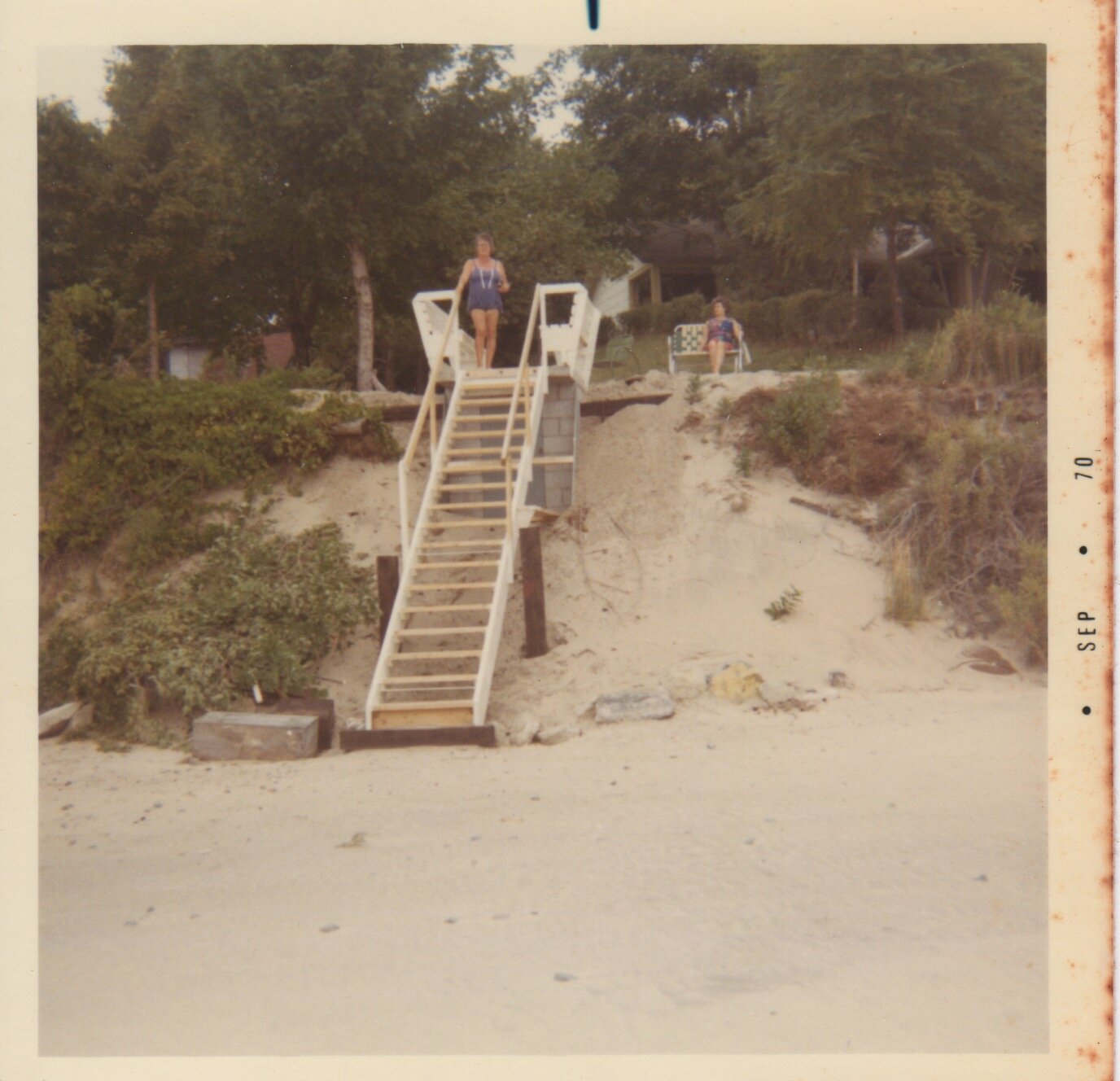 Pump house with benches on top and stairs to beach. The railroad tie wall is mostly buried under the growing sand dune (1970)
