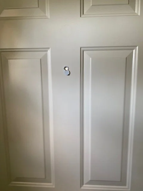 Added peep hole to entry door.