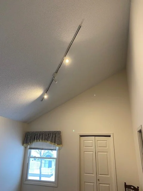 New lights installed and a good look at Pam's paint job. Yes the walls are high.