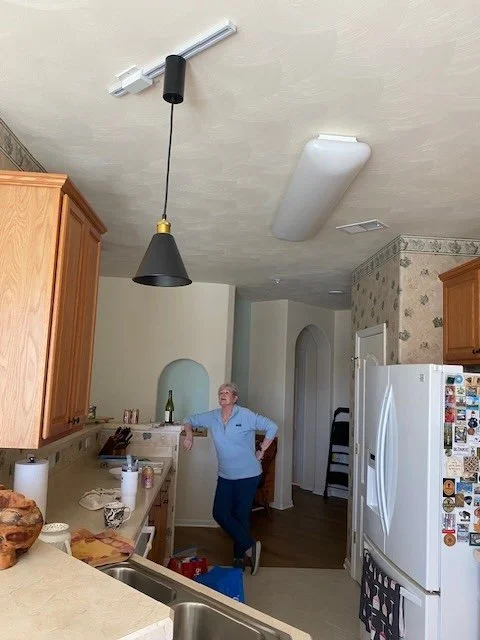 New pendant light in kitchen tracks and replaced fluorescents with LED tubes after removing ballast. 