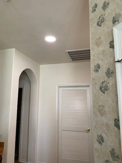 Several new flush mount lights in hallways.