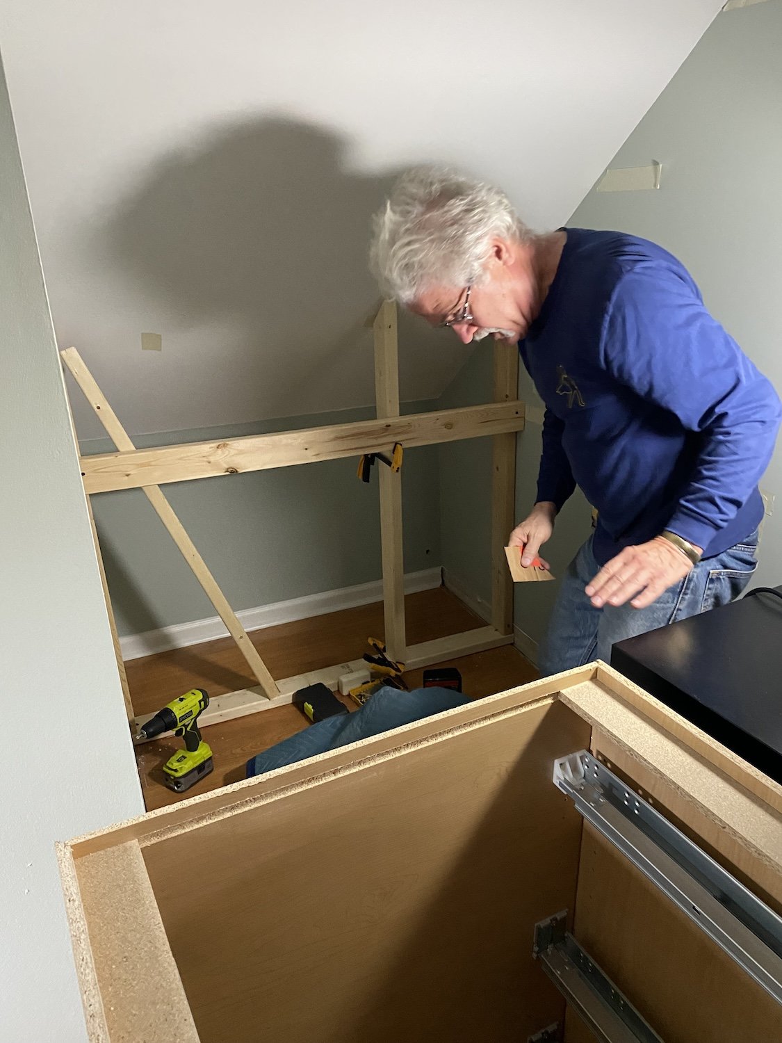 Building a new back wall in the very deep nook and adding a couple outlets
