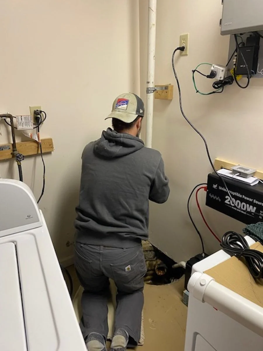 Jesse praying to the plumbing gods.