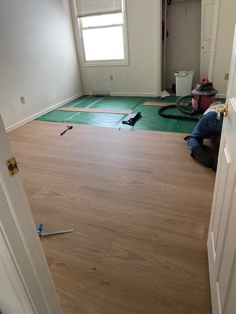 The flooring had a pad but we put an extra pad down to increase comfort and mitigate any small irregularities.