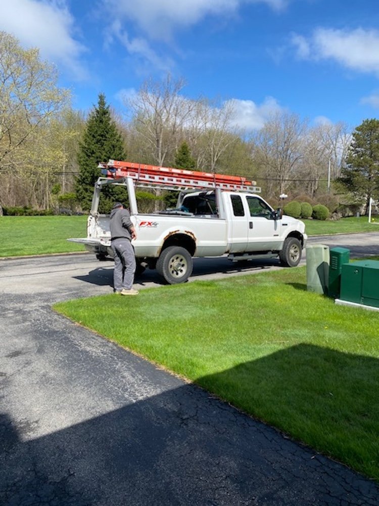 Jesse arriving with extra ladders (it took three in all)