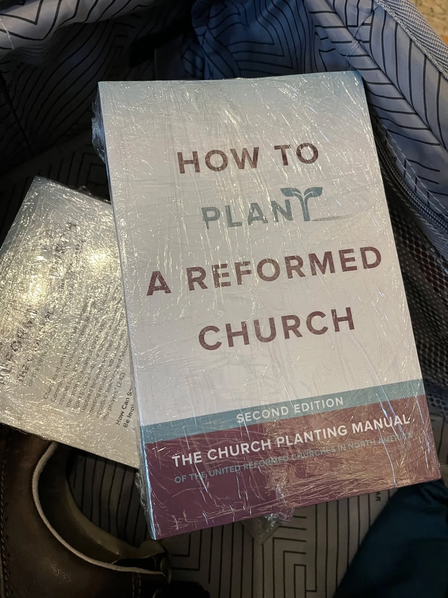 URCNA Church Planting Manuals wrapped and ready for transport to our Classis Eastern U.S. meeting next week at Ascension Reformed Church in Cincinnati. 

One copy for each of the 18 churches in our classis. Classis Eastern U.S. has the goal to launch
