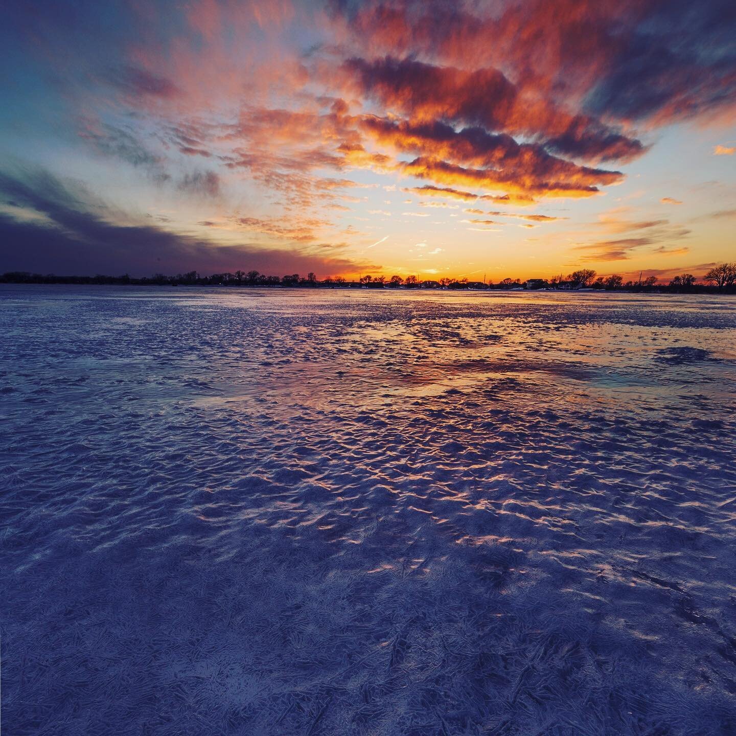 A  frozen Lake Manawa during sunset @unleashcb #iowaoutdoors #sunset#lovetheoutdoors #lakemanawa #