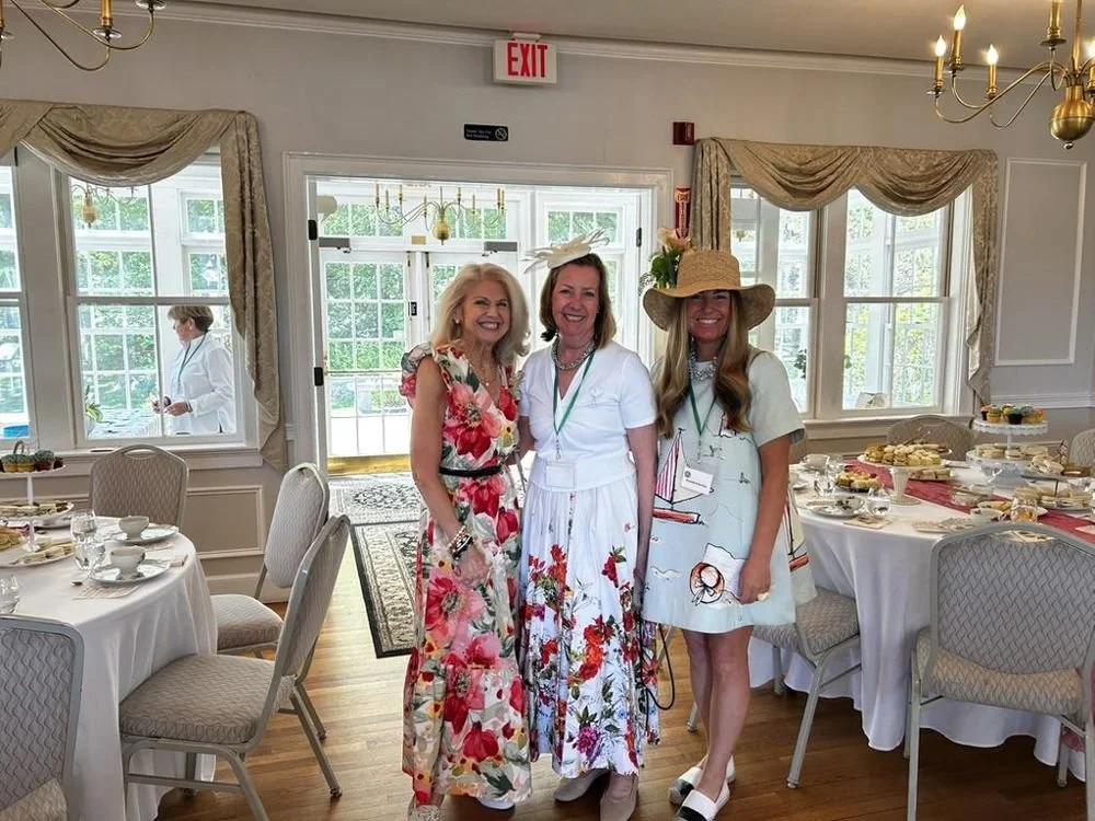 75-members-at-the-tea-tables-in-their-hats.jpg