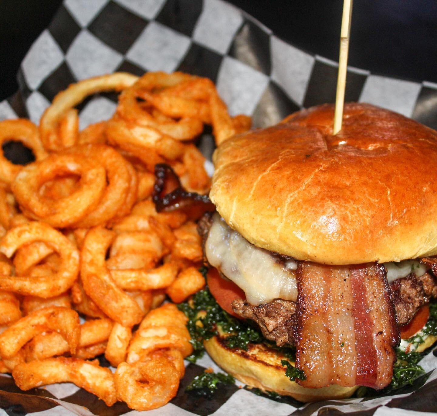 🚨MARCH B.O.M.B IS HERE:🚨
6 oz Seven Hills Farm Burger, Worcestershire Sauce, Provolone, Tomato, Grilled Onions, Bacon, Fried Kale, and Aioli on a Brioche Bun