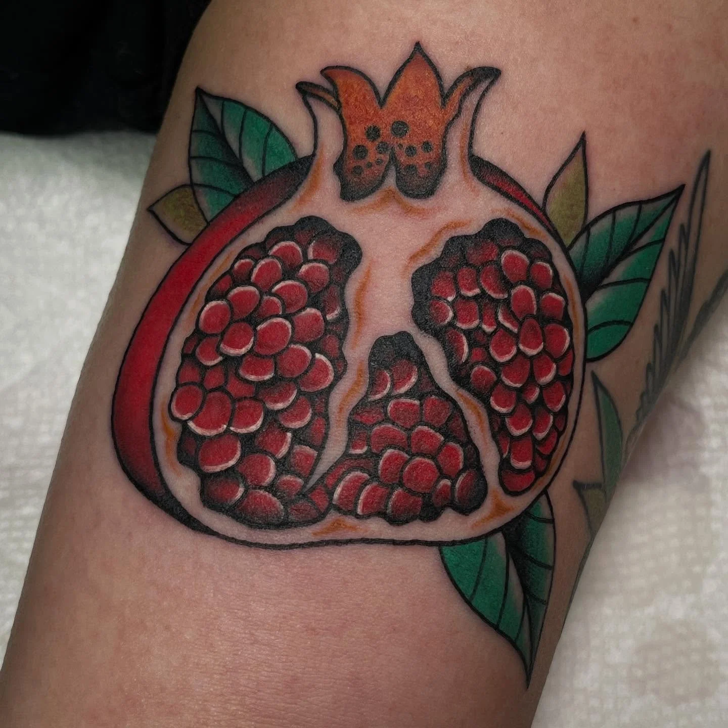 A cute pom from a while back &amp; a healed shot of a flash piece done on @kayjohunt thanks for coming back! 

#tattoos #art #femaletattooartist #ladytattooer #americantraditional #colortattoo #bright_and_bold #traditionaltattoo #pomegranate #fruitta