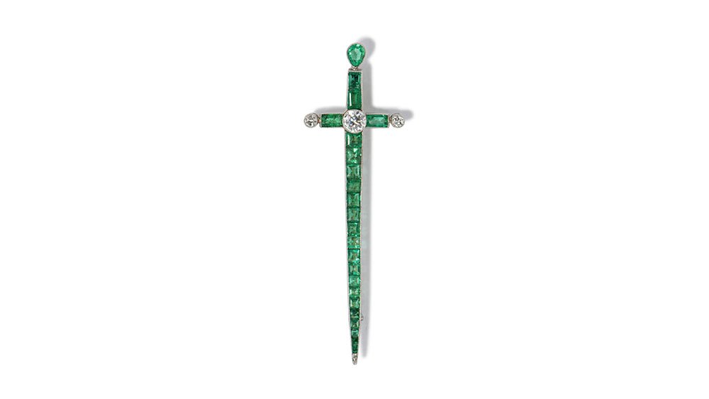    Platinum and 14k yellow gold emerald and old European cut diamond pin.   