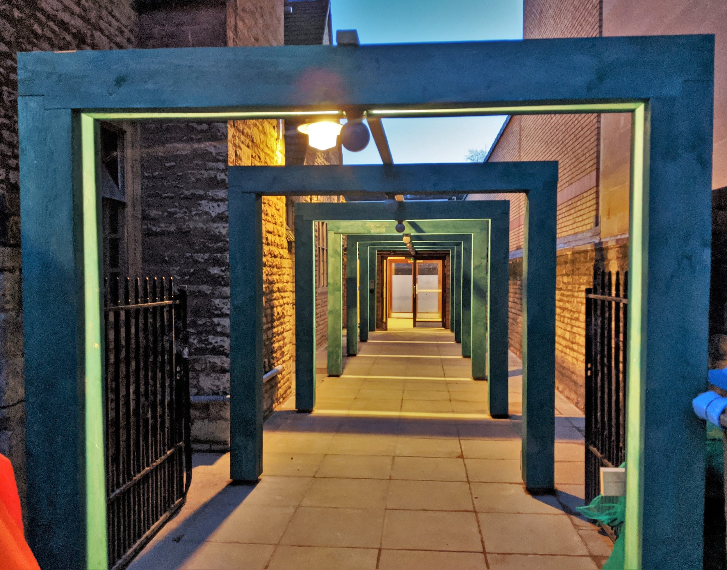 Floyds Row_After_New entrance with timber archways to glazed lobby.jpg