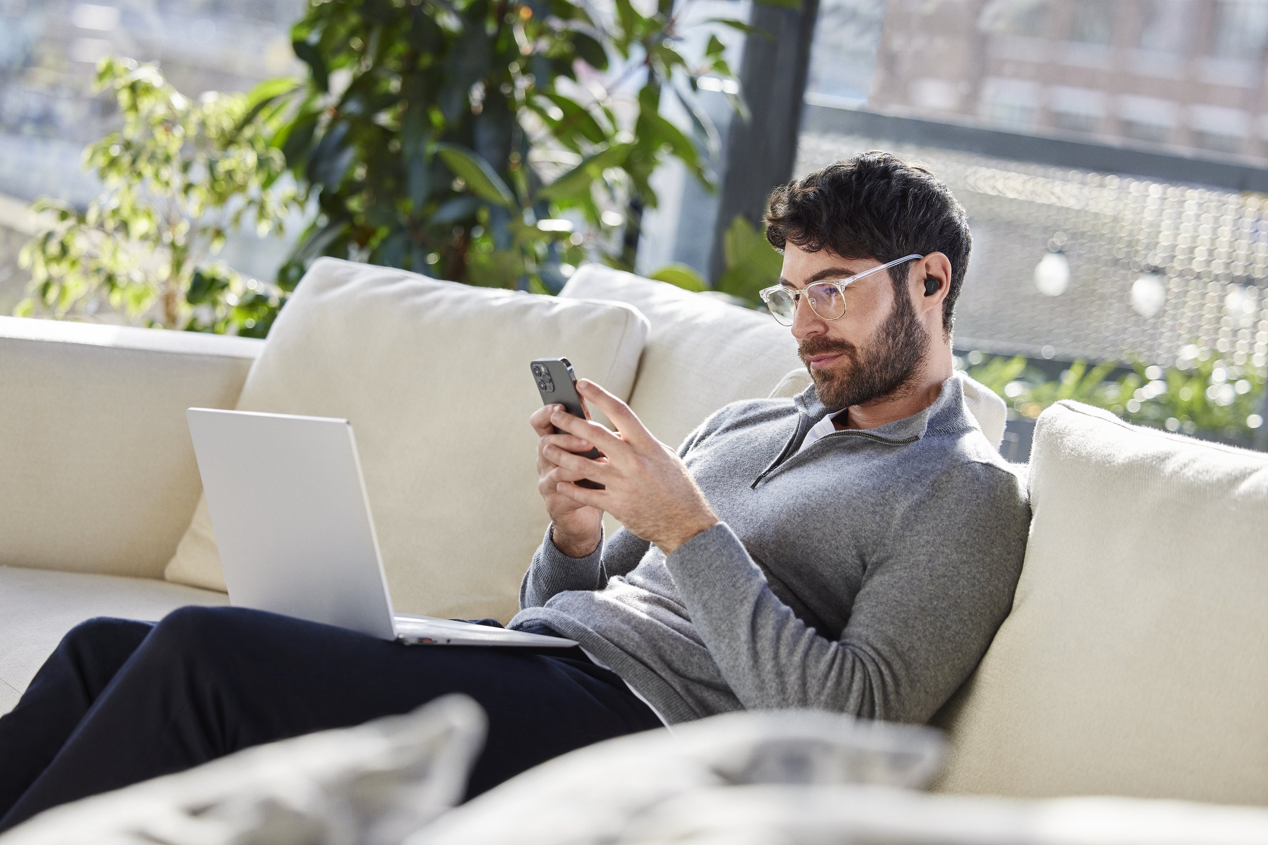 Jabra Evolve2 Buds male home couch laptop phone Medium.jpg