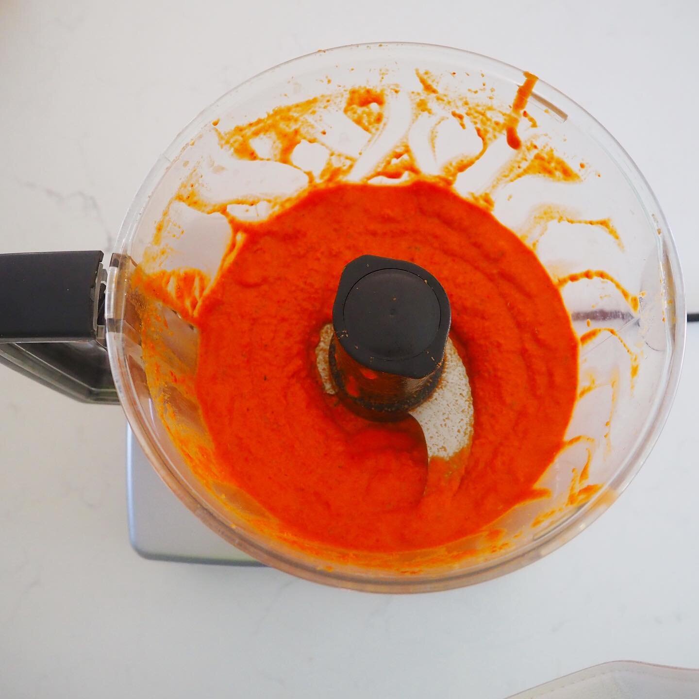 There are so many things that a food processor makes possible not least a whole range of pestos like this red pepper version. This vivid sauce is a mix of red peppers, almonds, olive oil, green chilli and a little apple vinegar. 
What makes the trans