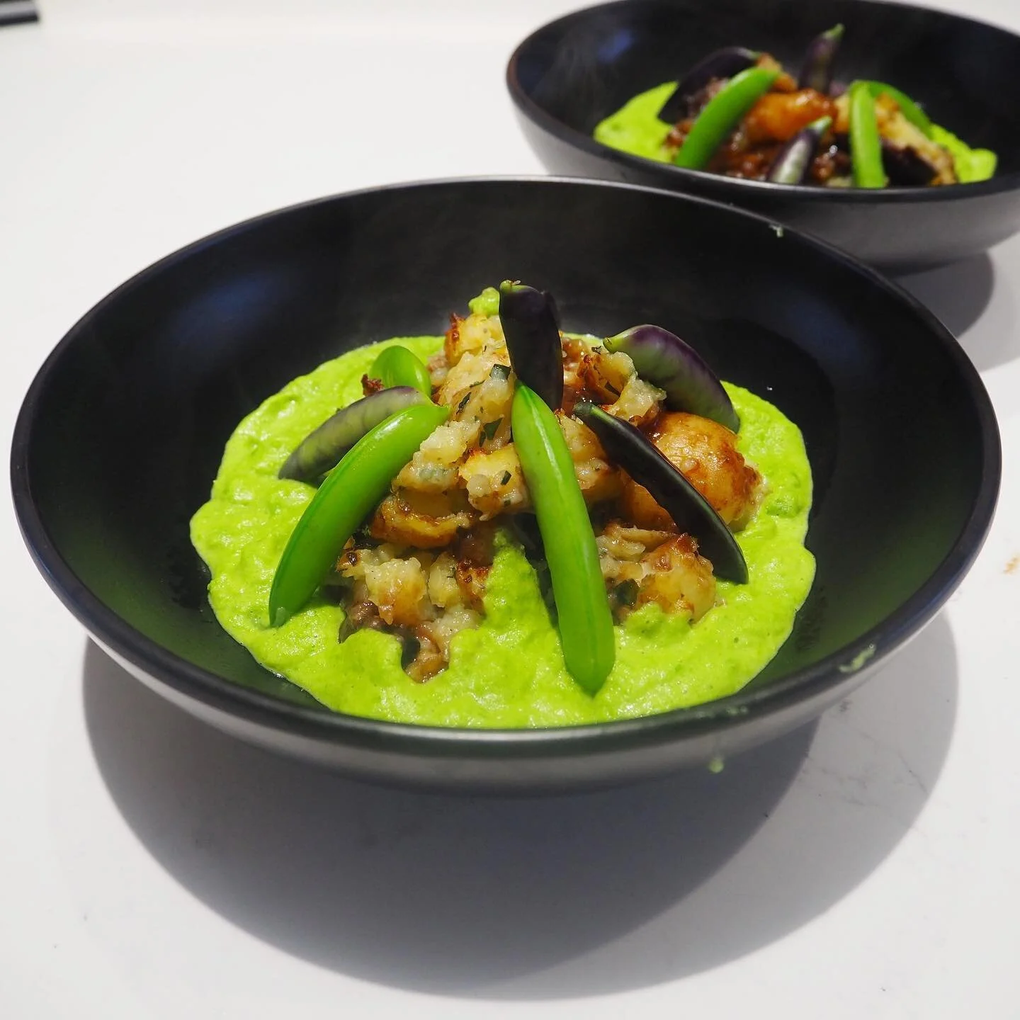 A celebration of the pea and in particular a welcome to the sugar snap peas picked from the garden and on the plate within a few hours. The beloved has grown the normal green ones plus some purple beauties. Don&rsquo;t they gleam on the plate helped 