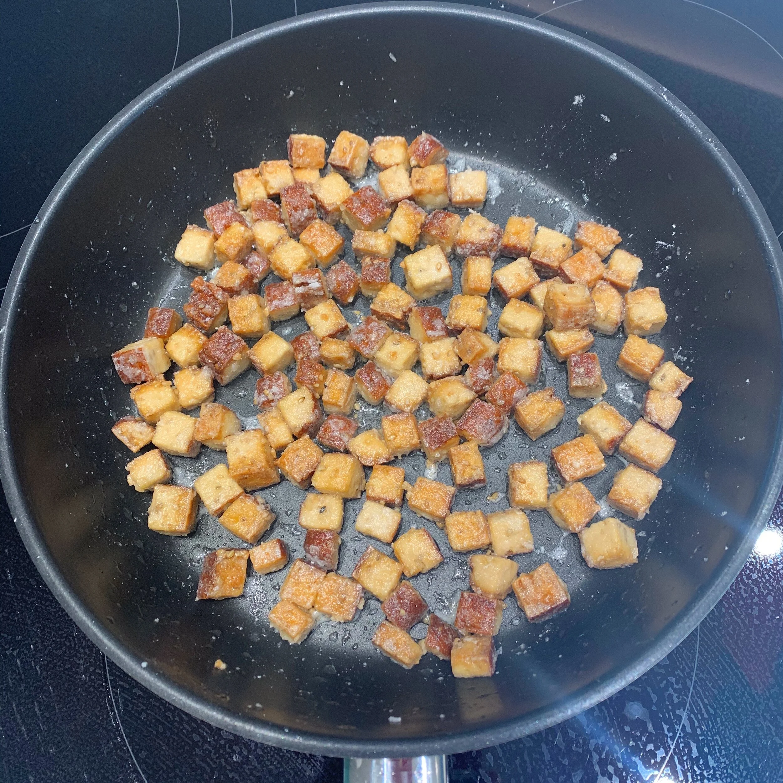 4. frying the tofu .jpeg