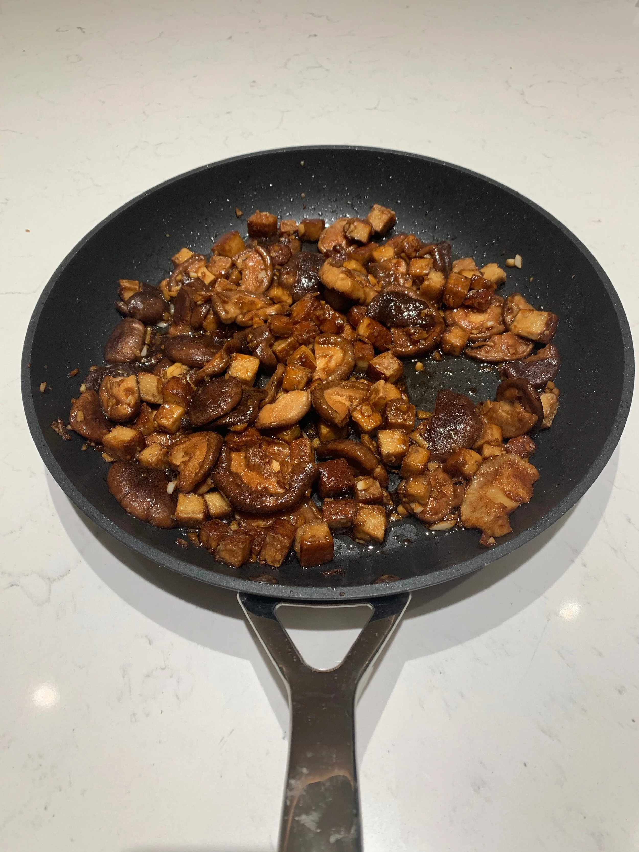 5. Mushrooms cooked, tofu and soya added:portrait.jpeg