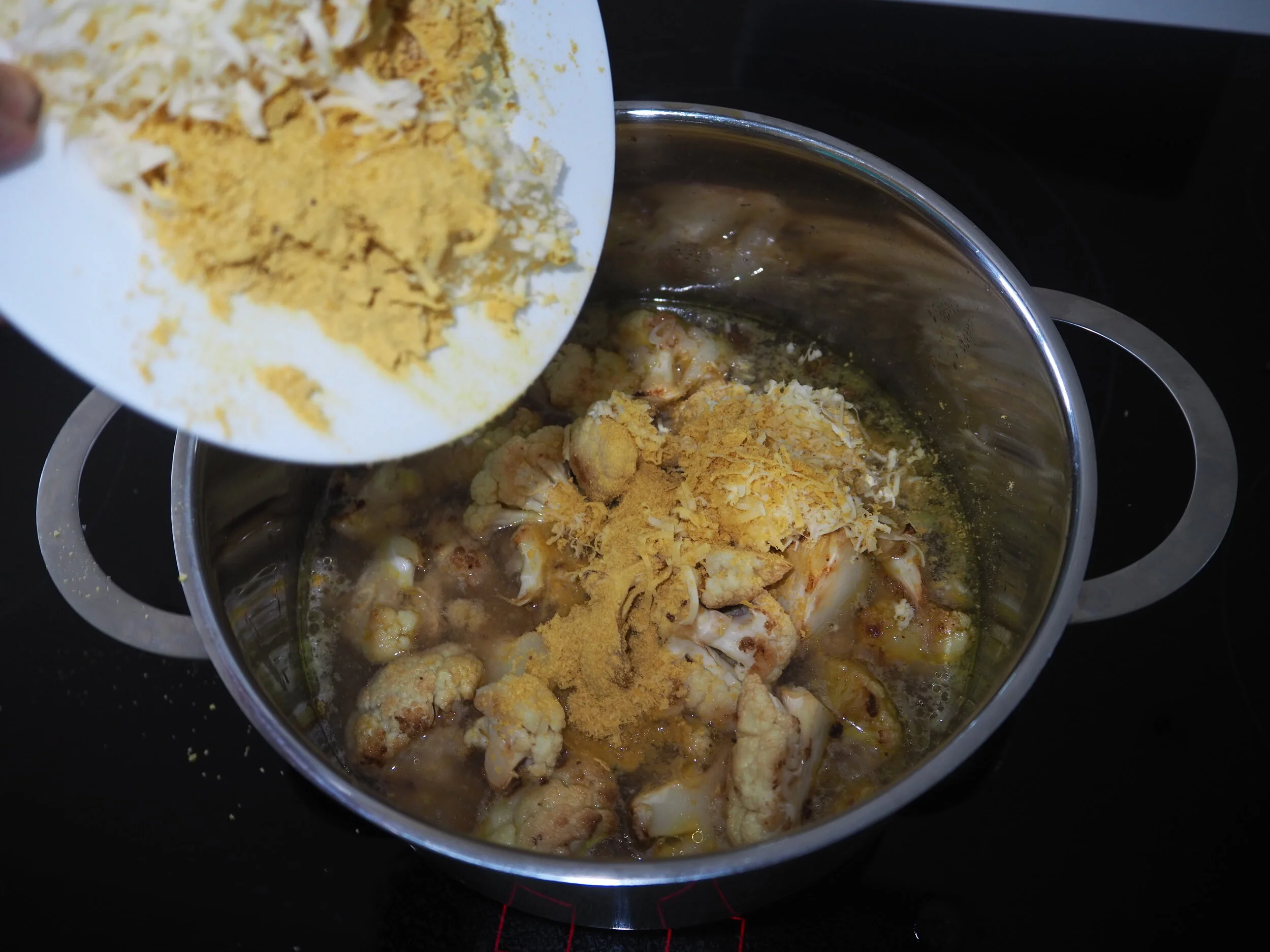 6. finally add in cheese and nutritional yeast.jpg