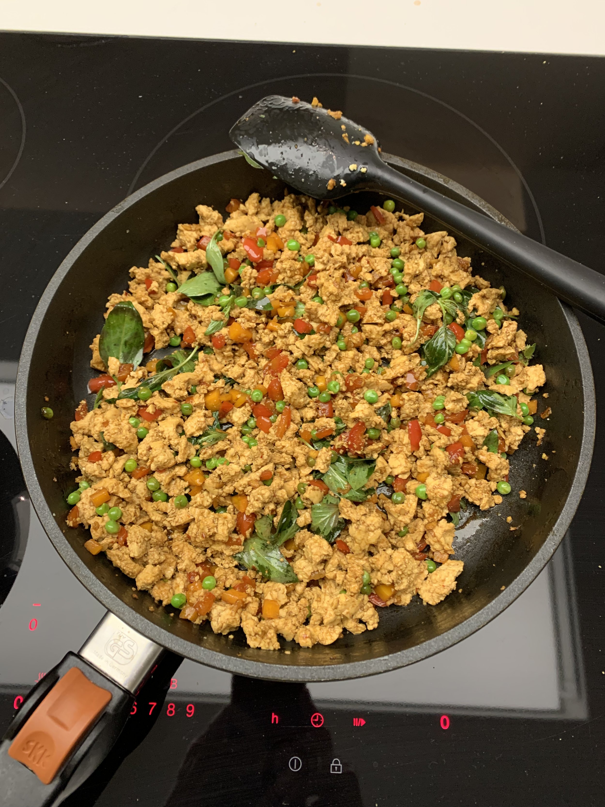 8. Sauce stirred through and basil added.jpeg