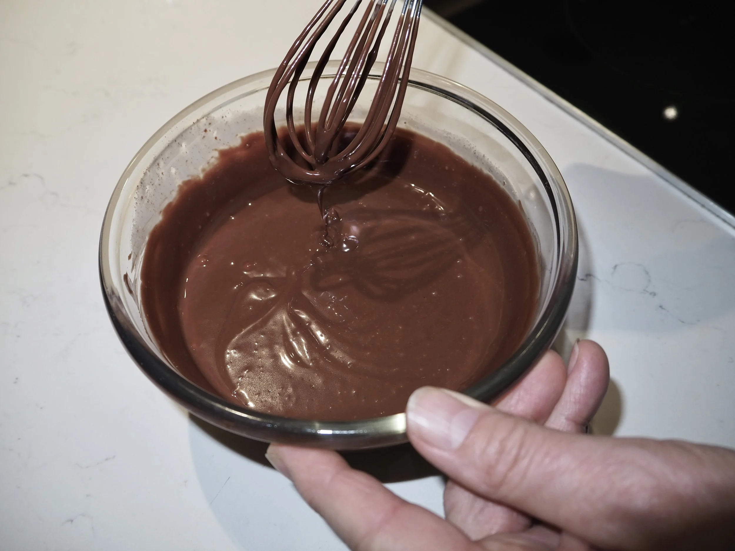 15, Whisking the ganache off the heat.JPG