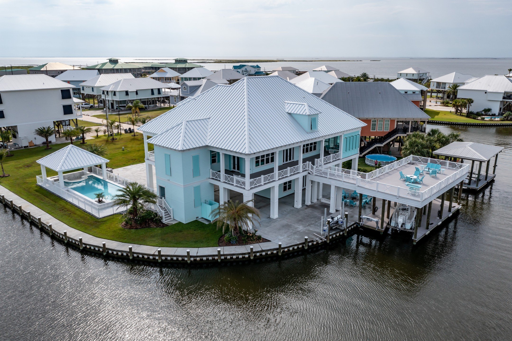 We're going to take you on a journey from outside to inside on one of our favorite properties, Bird Reef, in Queen Bess, Grand Isle, LA. Check out all of the details and features on the exterior of this property. Next up we will give you a taste of t