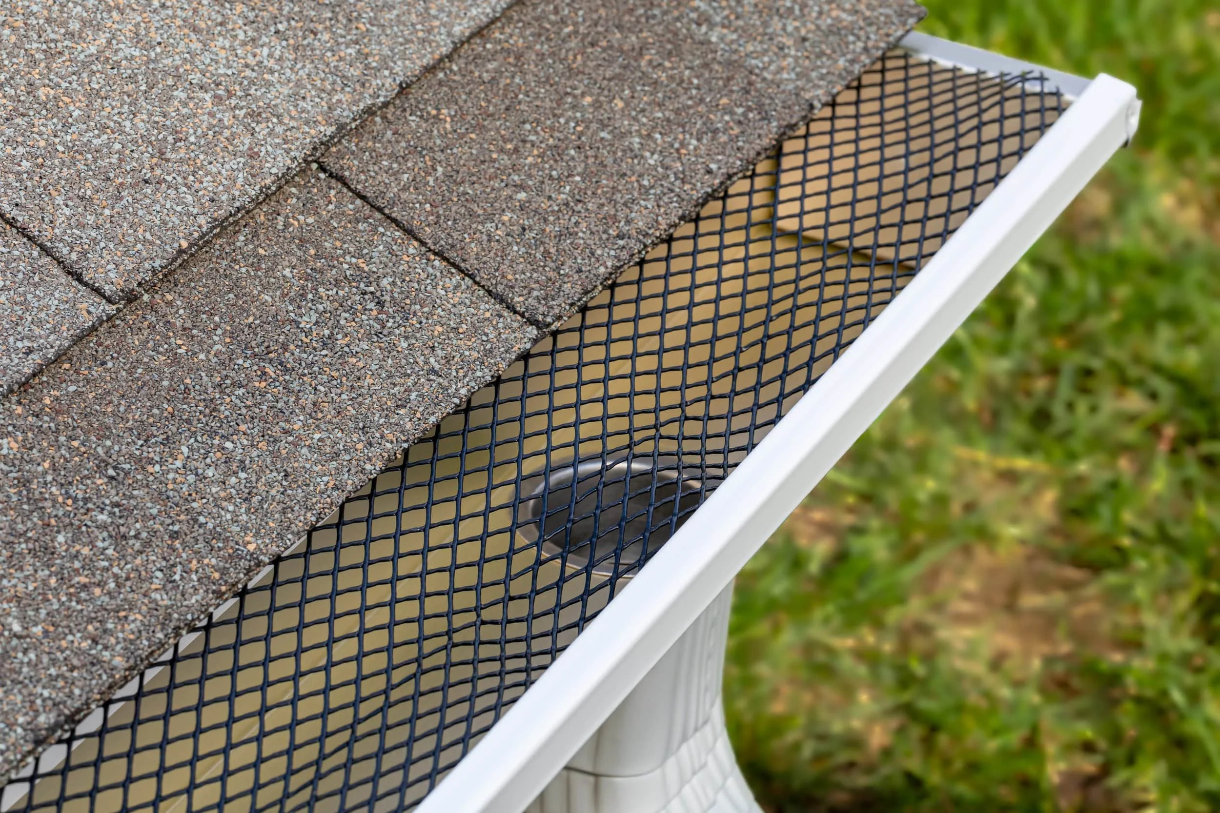Close up of gutter guard installed on a home protecting gutters from leaves and debris