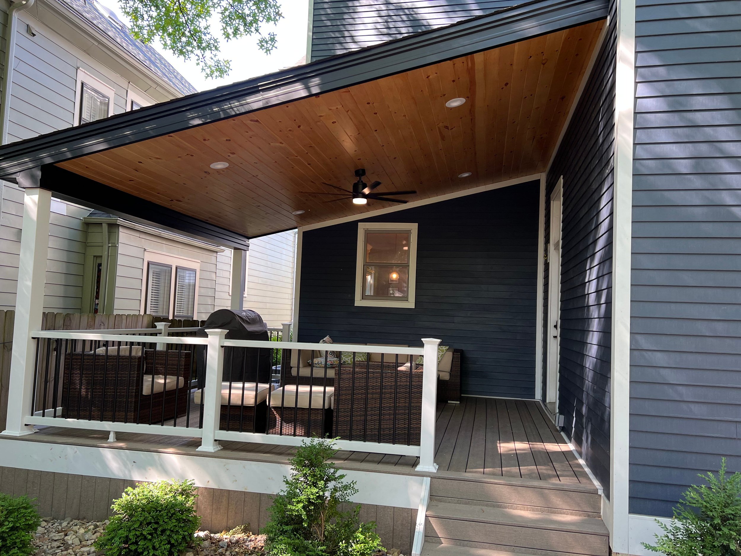 Covered front porch with support columns and open sides