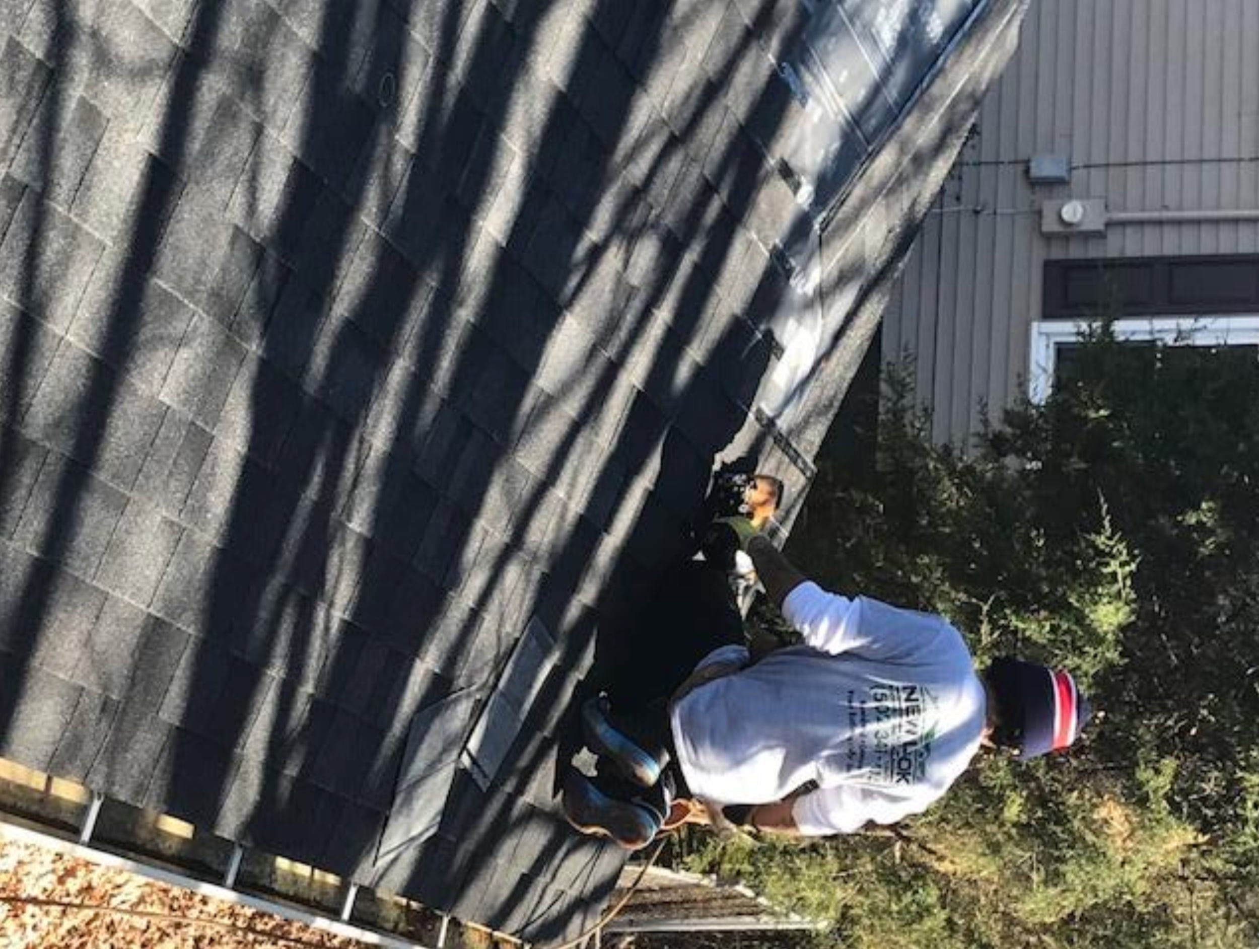 roofing contractors installing new shingles